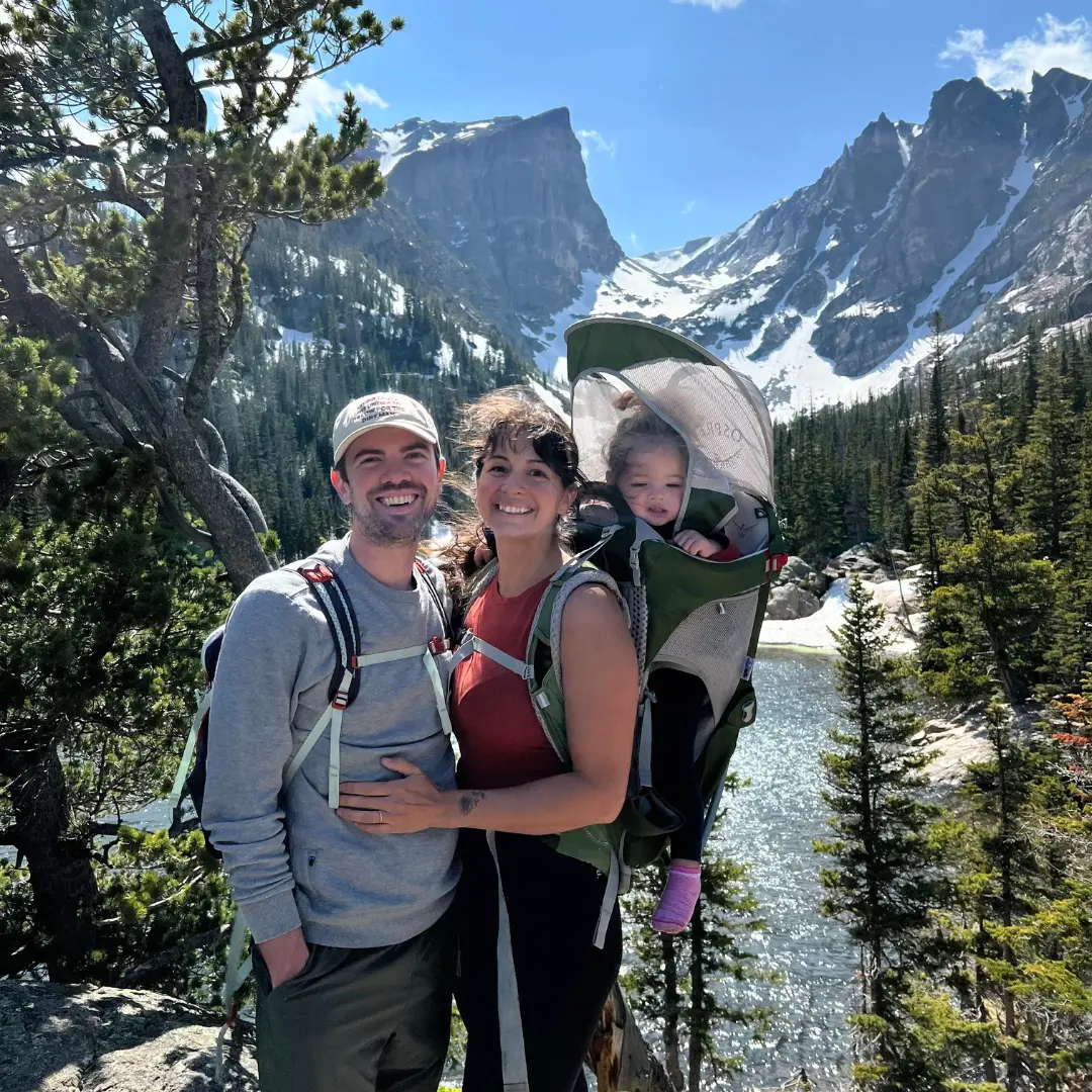 Andrew Ansley with his family hiking in the mountains